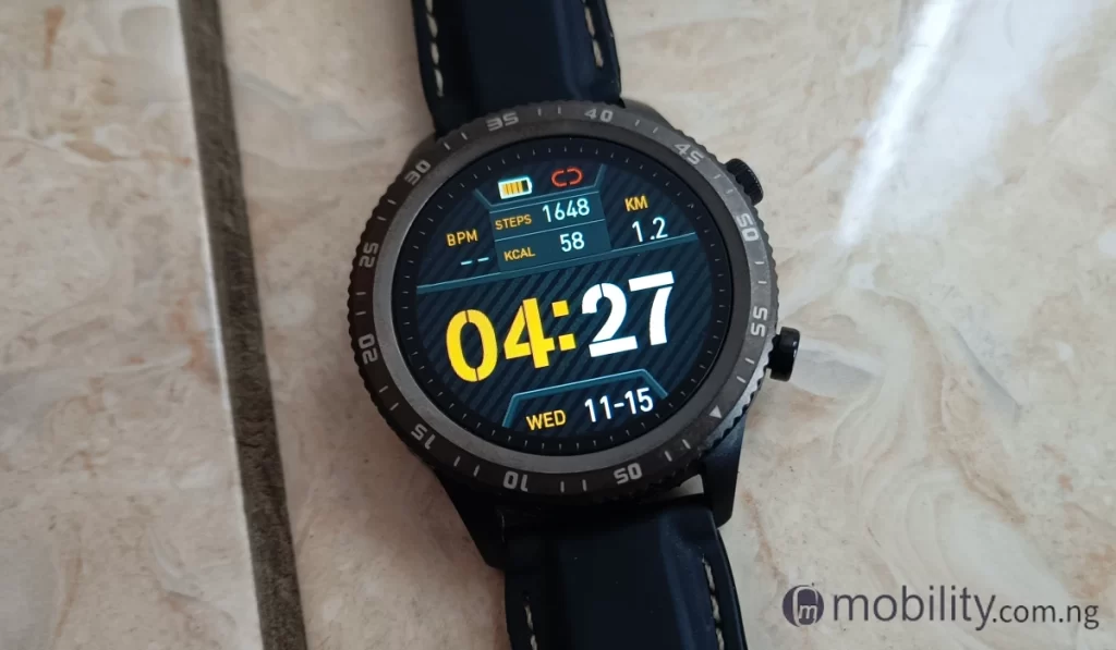 TECNO Spark 10 5G camera review sample; smartwatch indoors. 