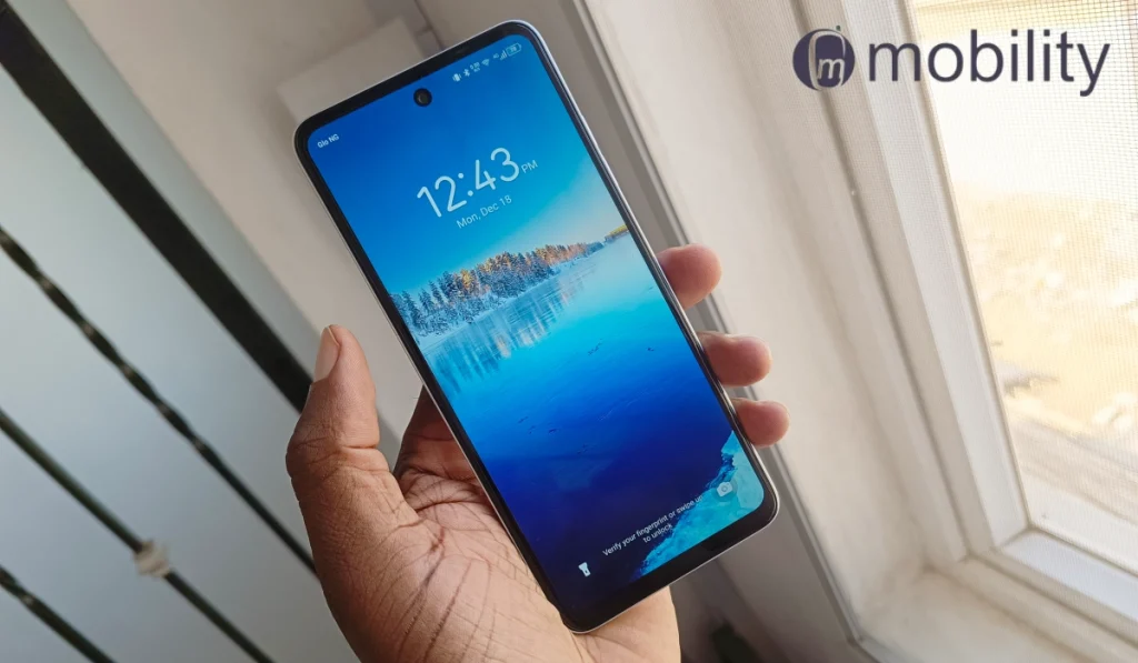 TECNO Spark Go 2024 review: phone in hand, showing the lockscreen 